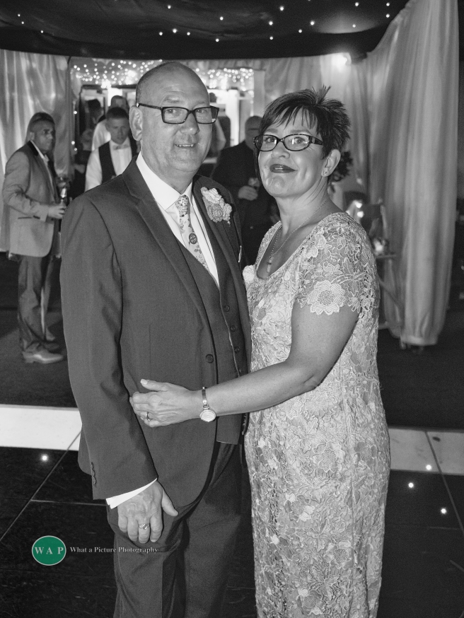 Mom and dad enjoying the reception