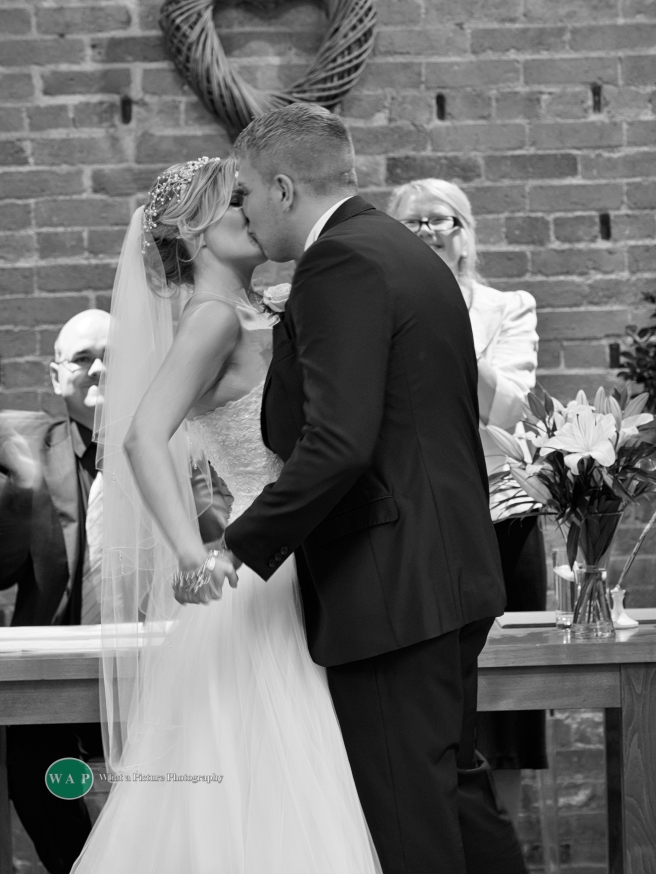 first kiss by What a Picture Photography